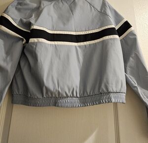 Light Blue Jacket with Black and White Stripes